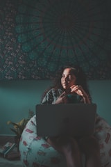 A student learning online in a comfortable environment.