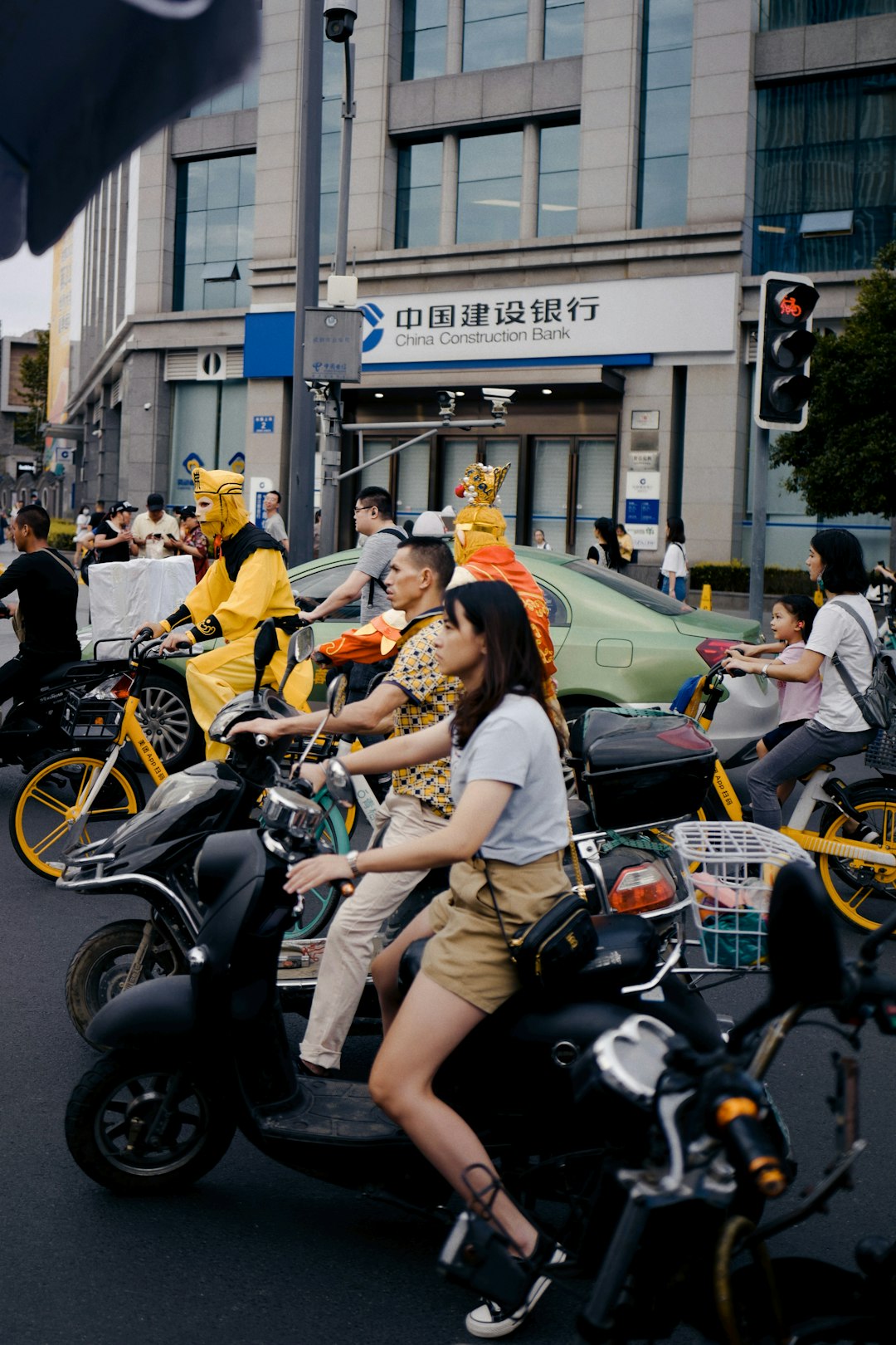 people riding motorcycle on road during daytime