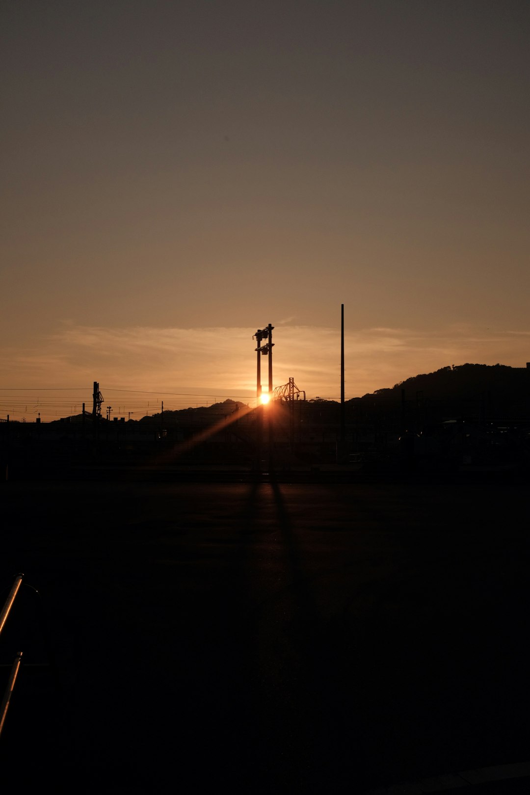 silhouette of tower during sunset