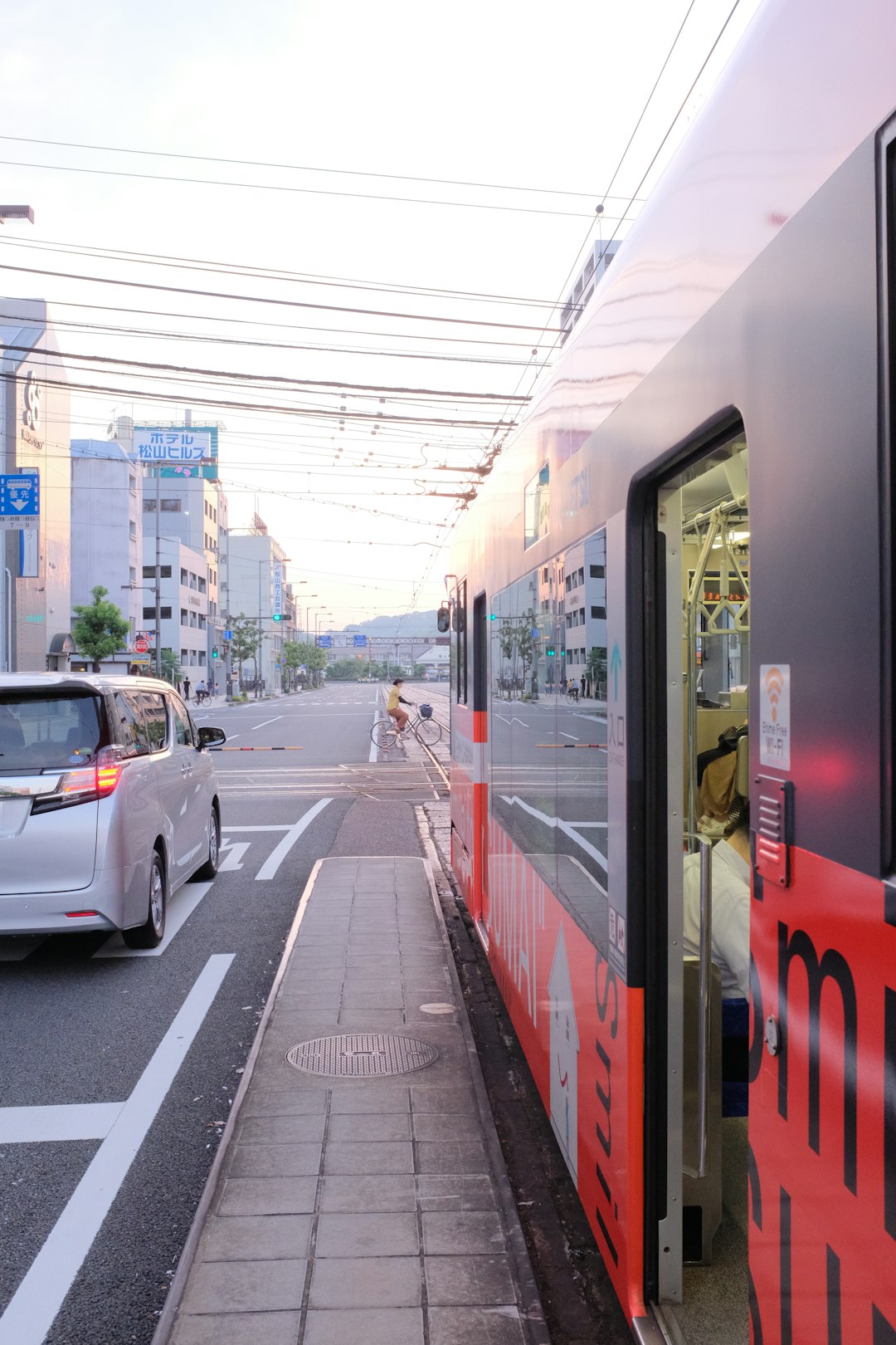 cars on road near building during daytime