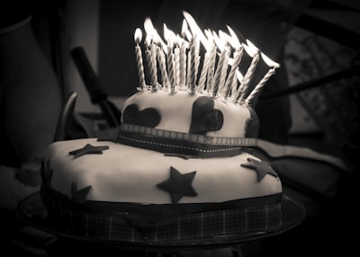 Fun and colorful cake toppers shaped like stars and hearts for kids' parties