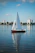red and white boat on sea during daytime