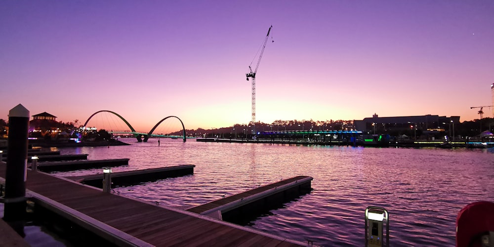 body of water near city buildings during daytime