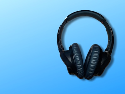Wireless headphones with cushioned ear pads displayed on a white background.