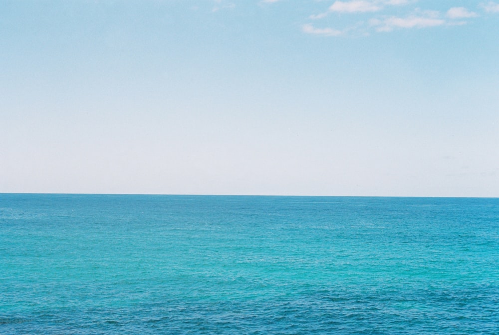 blue sea under white sky during daytime