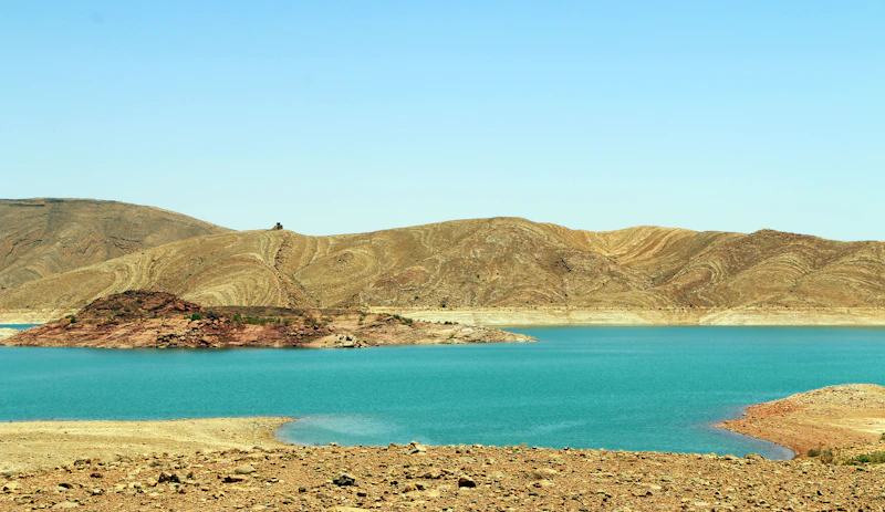 Turquoise lake surrounded by hills near Marrakech