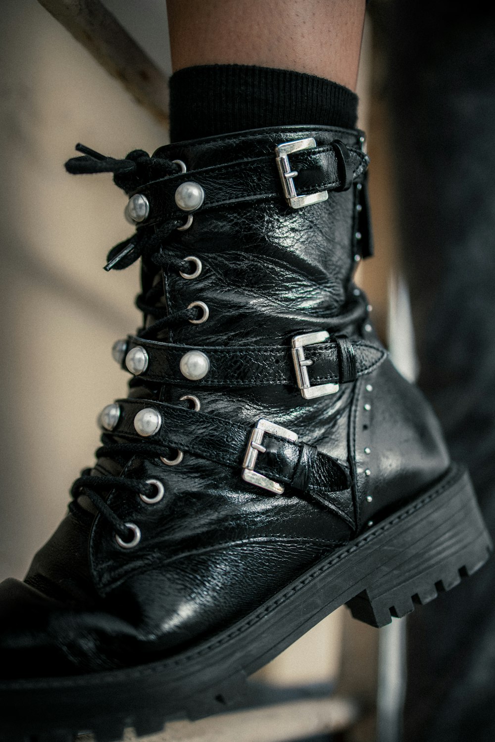 black leather lace up boots