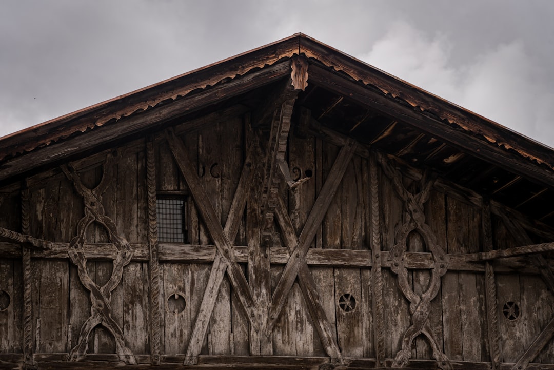 brown wooden house under blue sky during daytime