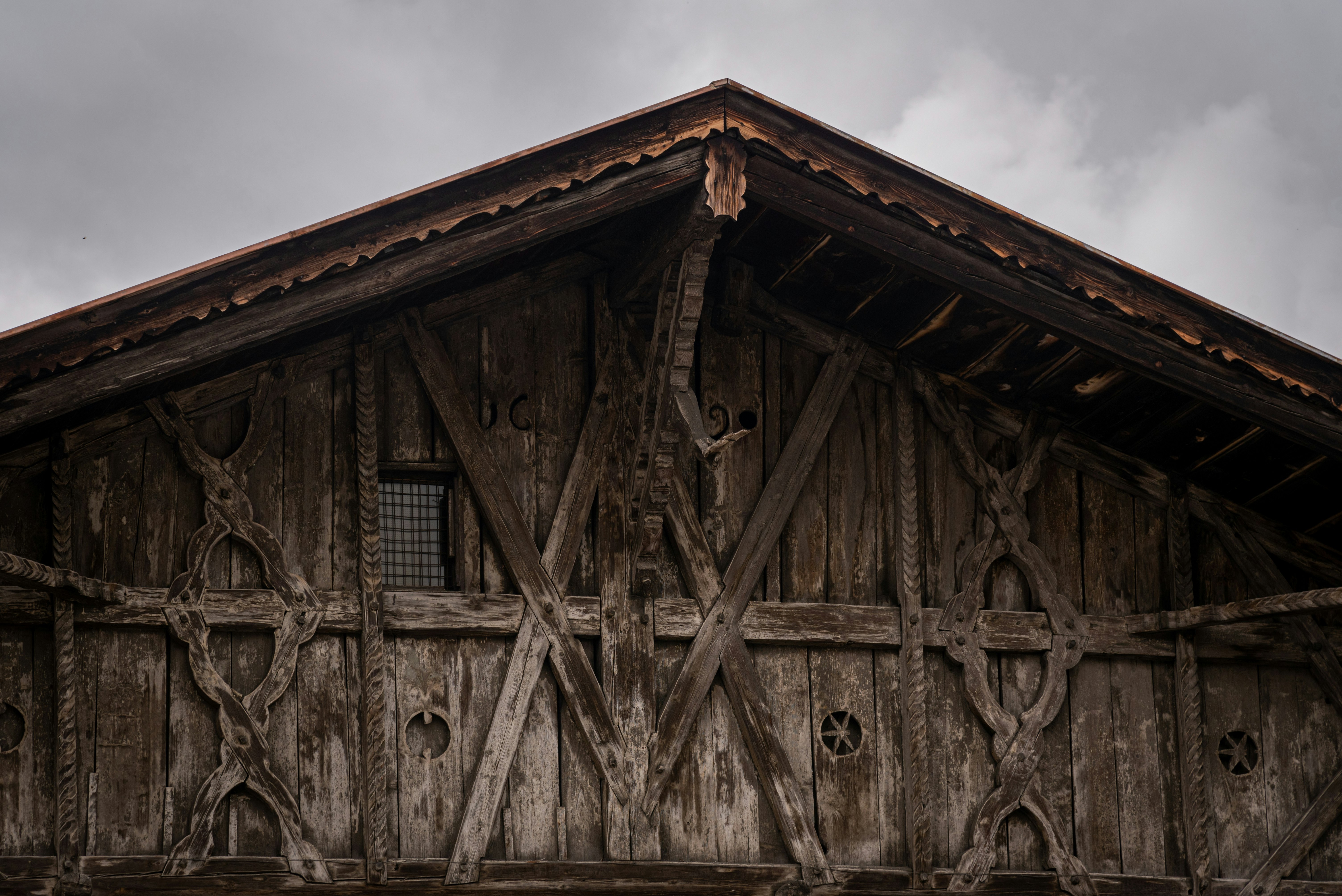 brown wooden house under blue sky during daytime