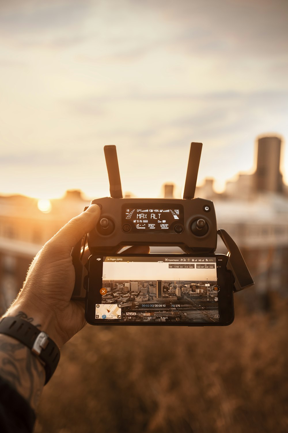 person holding black video camera