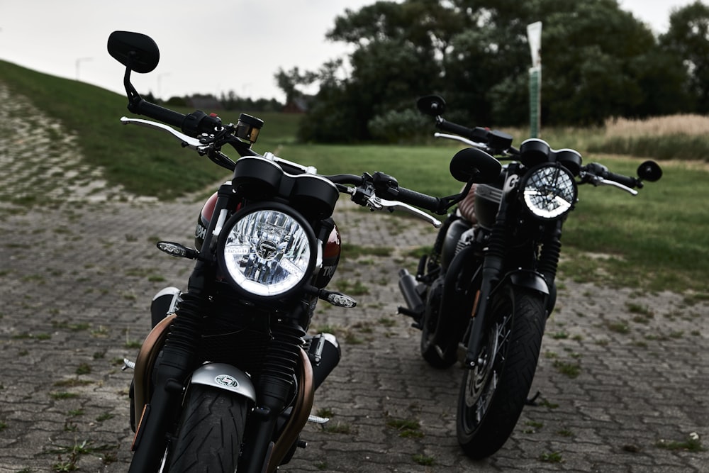 black and brown motorcycle on gray concrete road