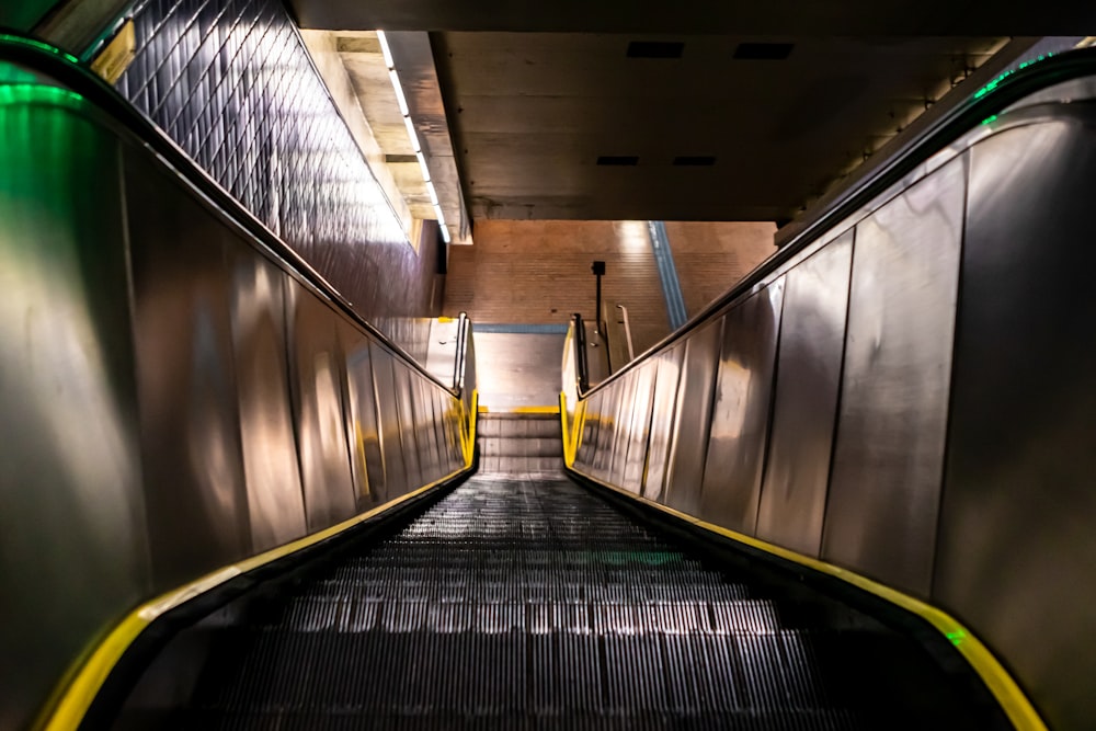 black and white hallway with stainless steel railings