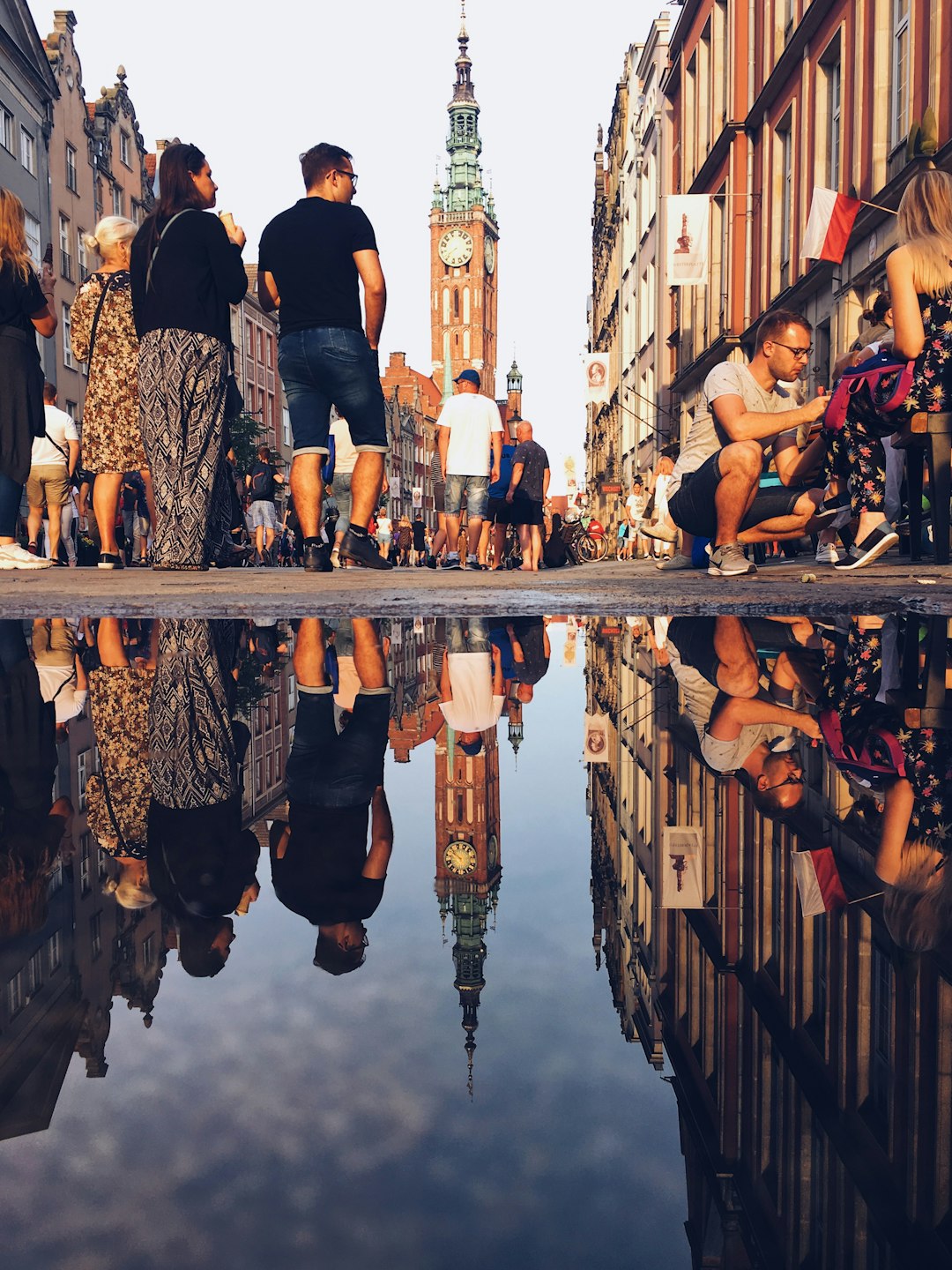 people standing on bridge during daytime