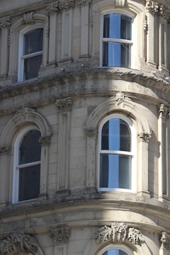 Before and after images of a restored facade highlighting the transformation.