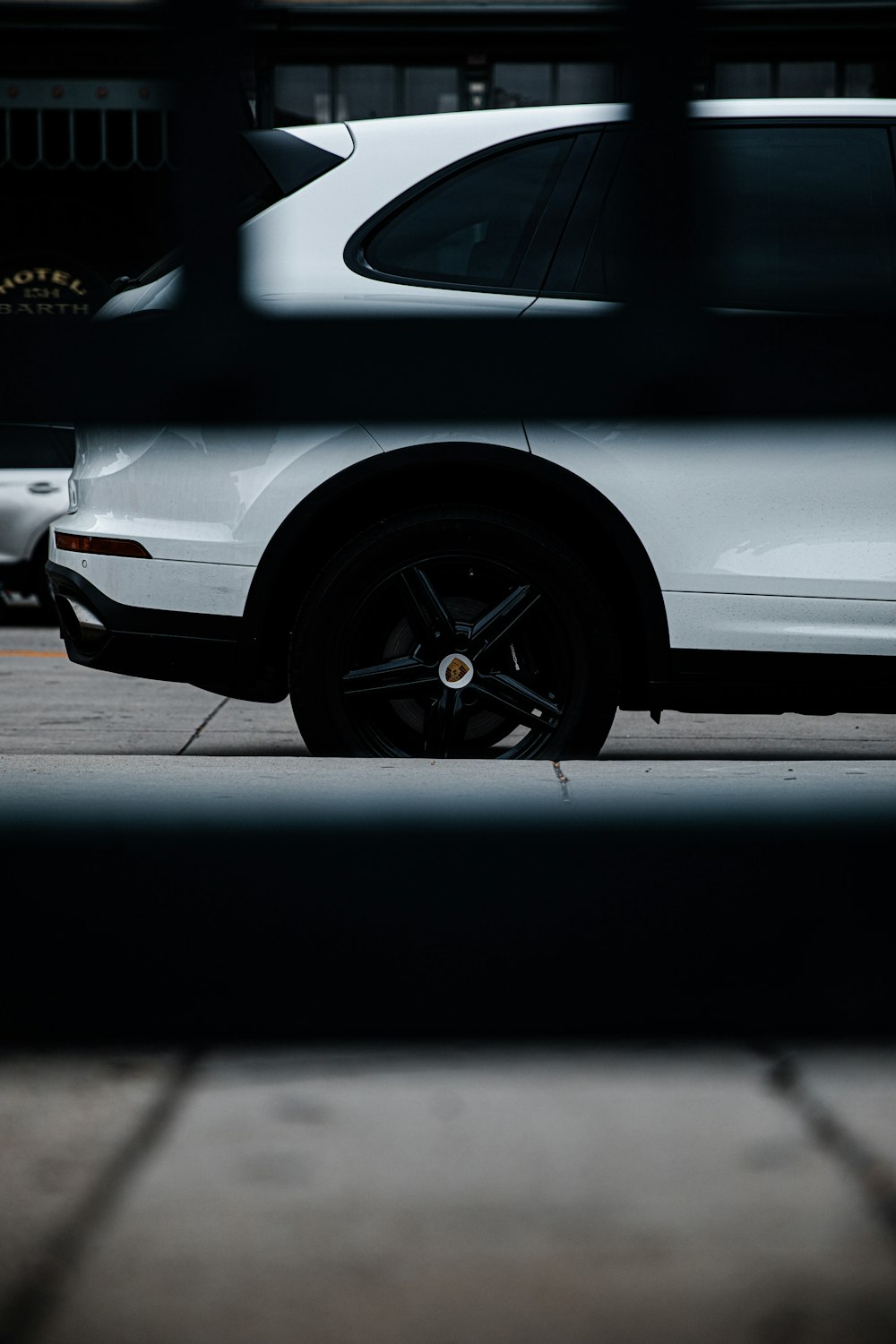 white car with black wheel