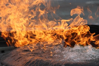 A serene close-up of contrasting natural elements like fire and water blending together.