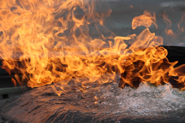 A serene close-up of contrasting natural elements like fire and water blending together.
