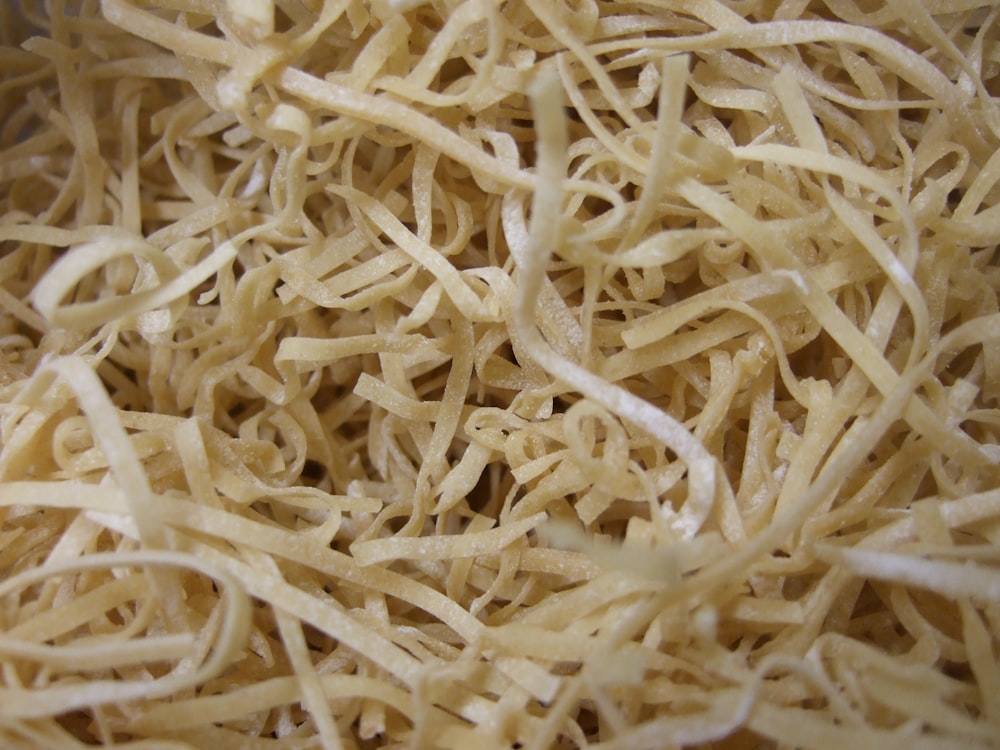 white pasta on white ceramic plate