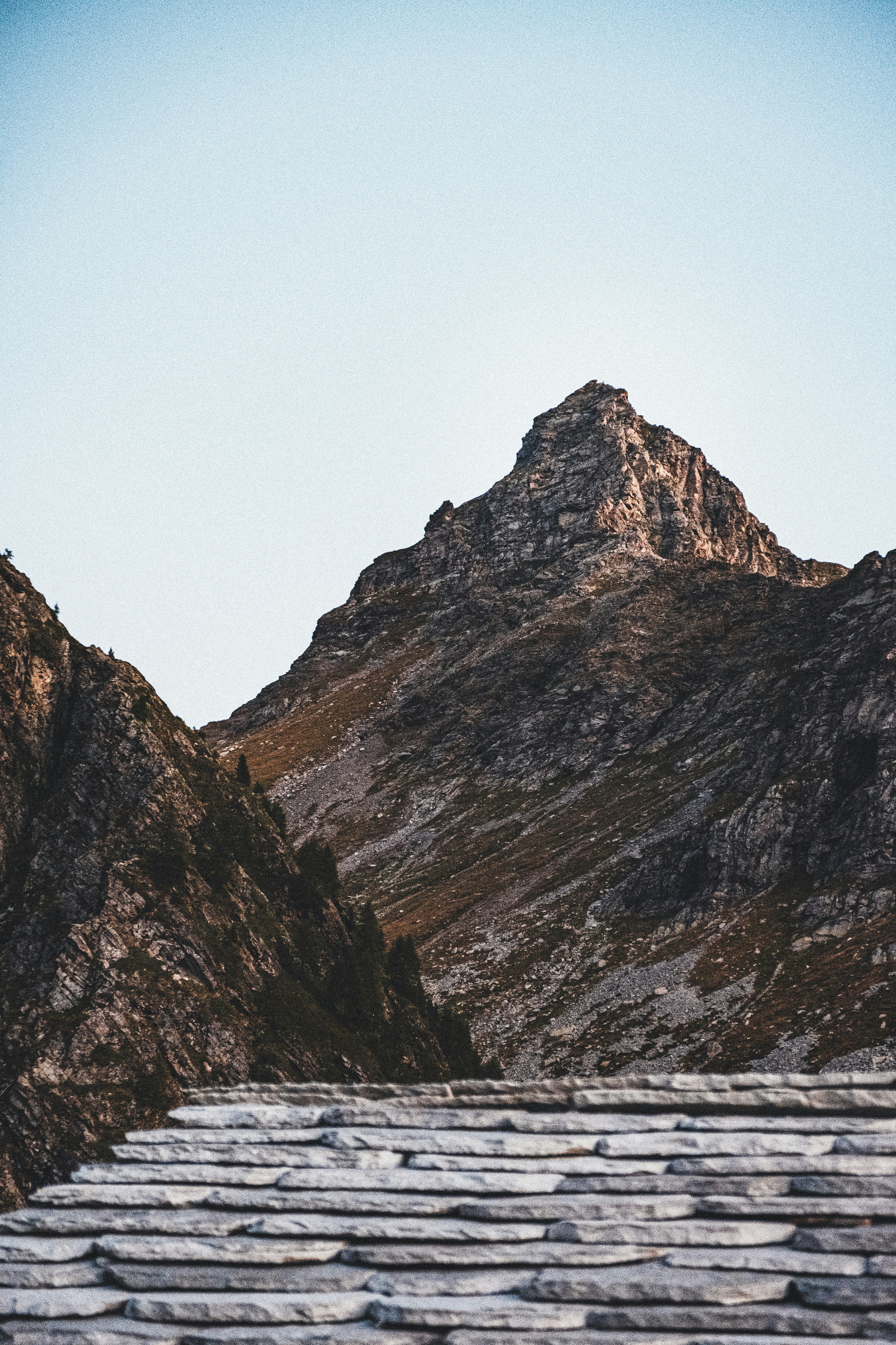 brown and gray rocky mountain under blue sky during daytime