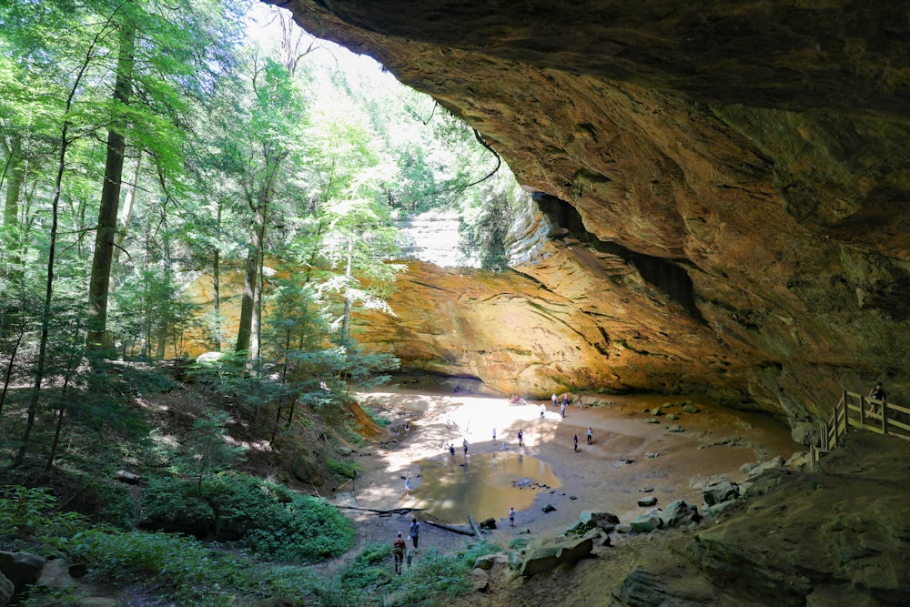 brown rock formation near body of water during daytime