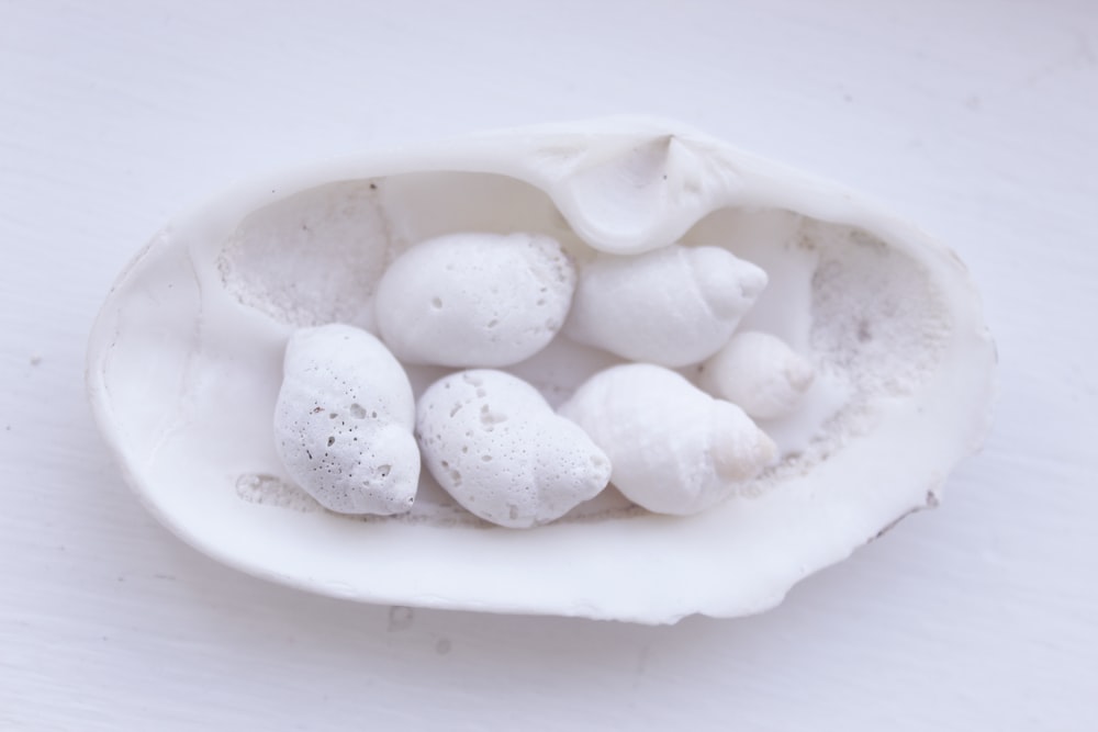 white eggs on white ceramic bowl