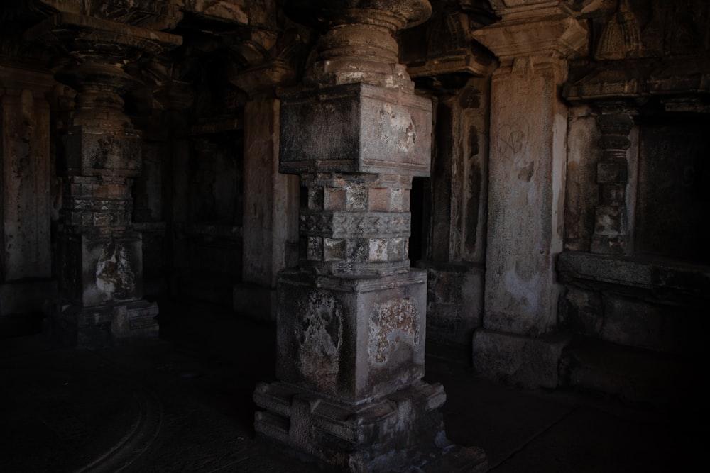 gray concrete pillar inside building