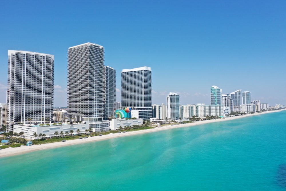 city skyline near sea during daytime