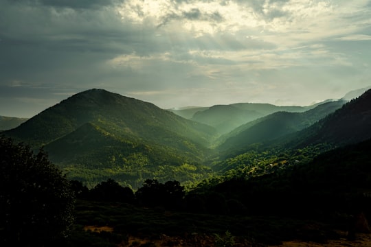 green mountains under white clouds during daytime in Borée France