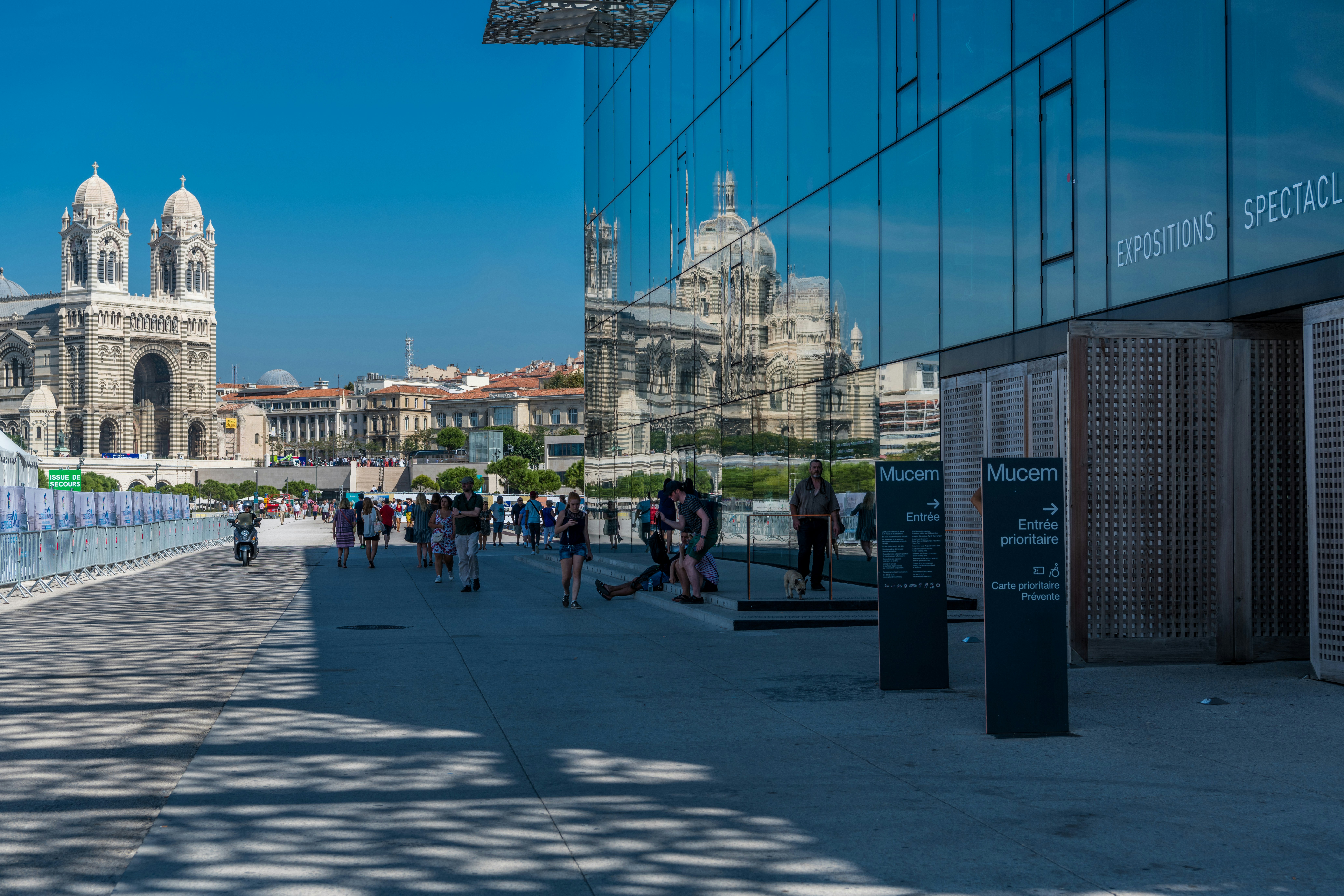 At the main entrance to the MUCEM with the reflection of Cathedral de Major in the glass