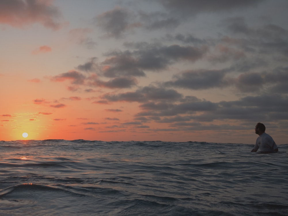 body of water during sunset