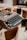 black typewriter on brown wooden table