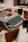 black typewriter on brown wooden table