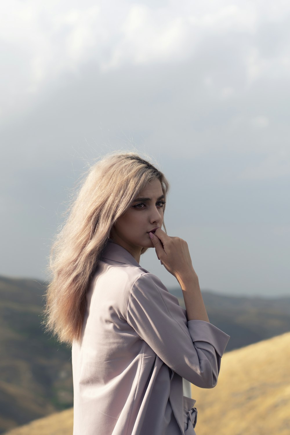 woman in white long sleeve shirt