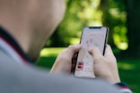 person holding silver iphone 6