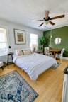 white bed linen on bed