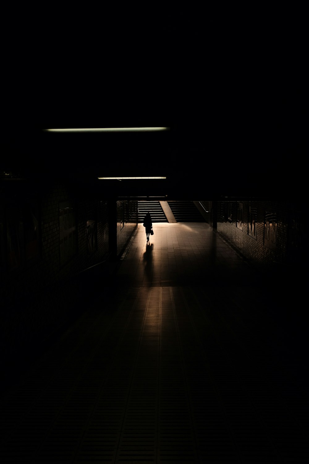 empty hallway with light turned on in the dark