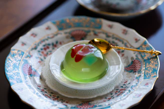 Elegant dessert plates featuring Asian-inspired sweets with delicate garnishes.