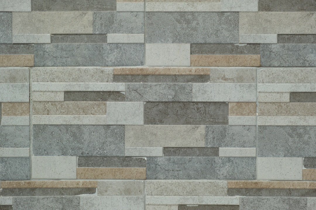 white and gray concrete floor, stone wall background and texture