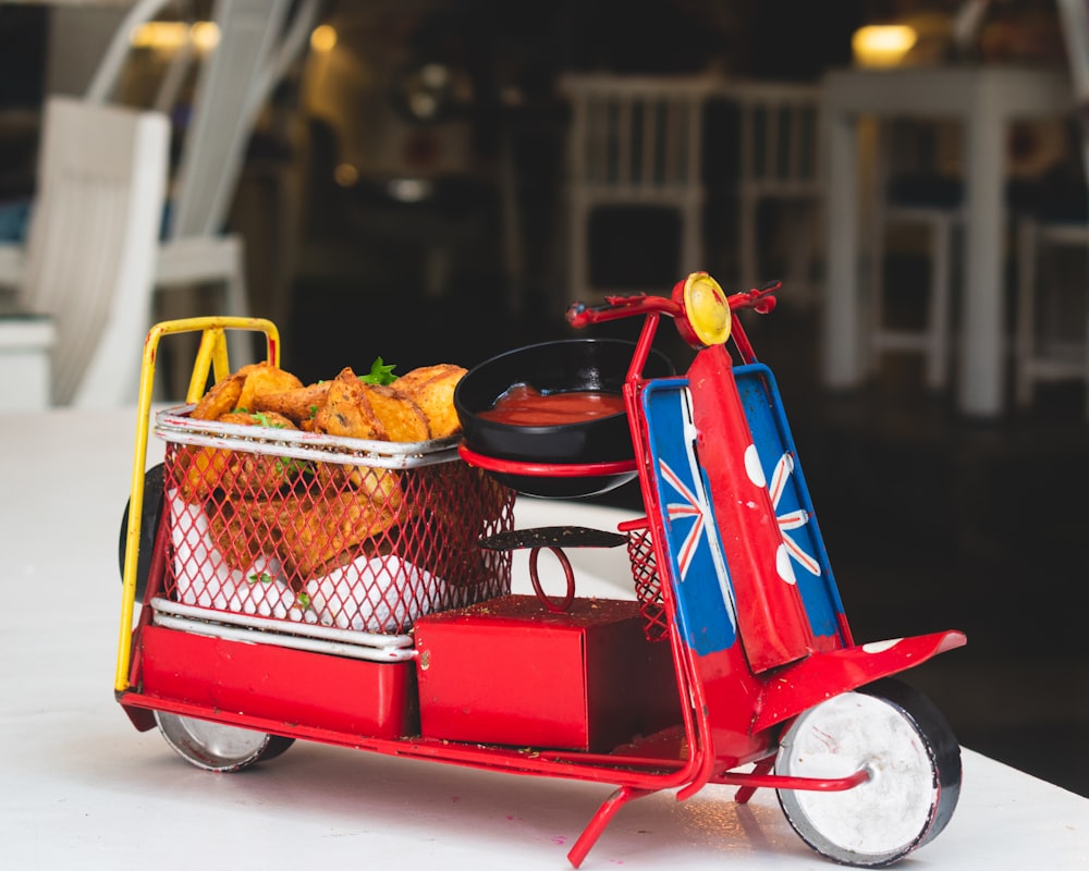 red and white ride on toy car