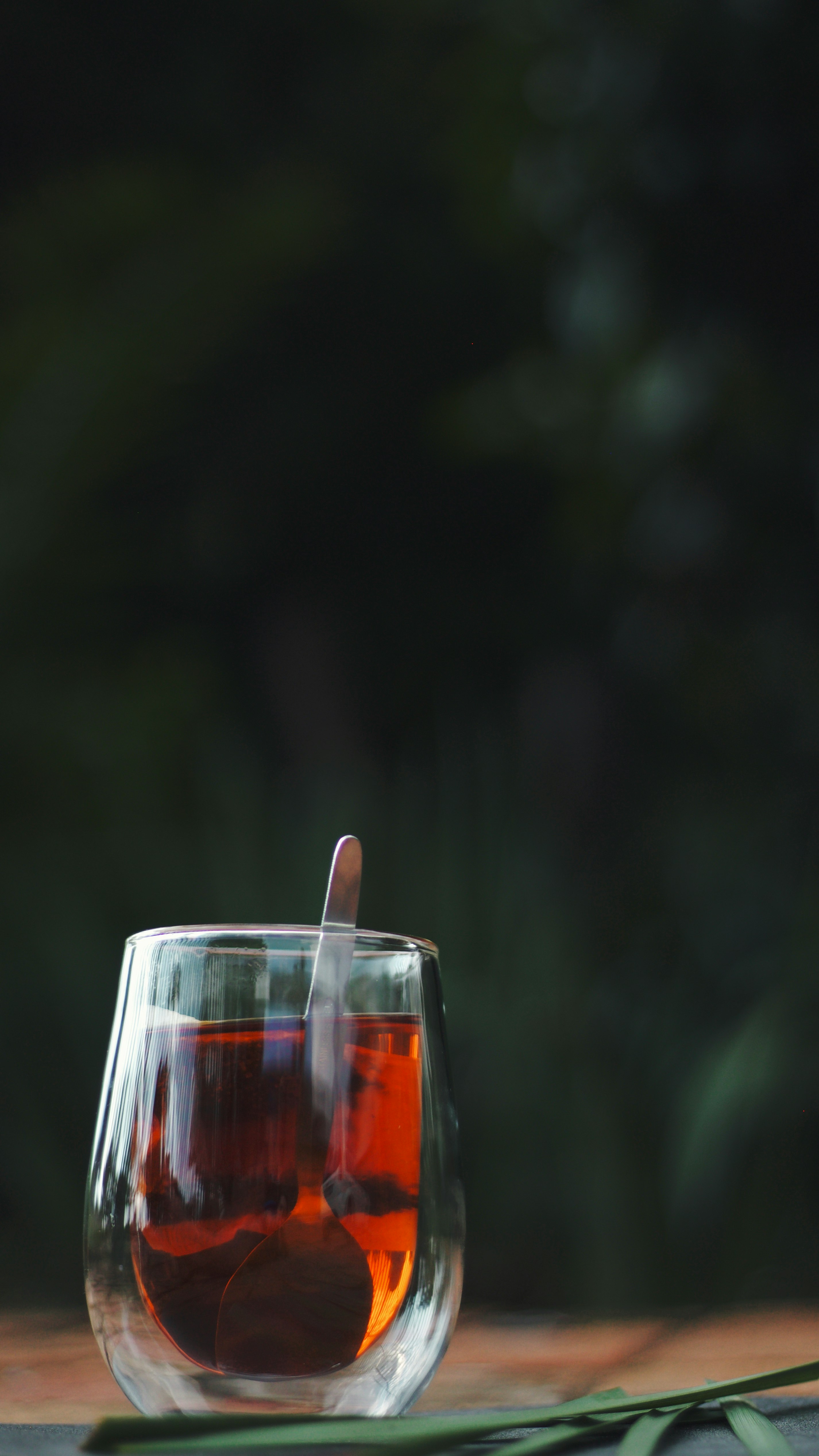 clear drinking glass with red liquid