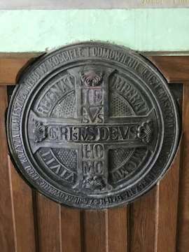 Custom laser-engraved wooden plaque with intricate Viking motifs.