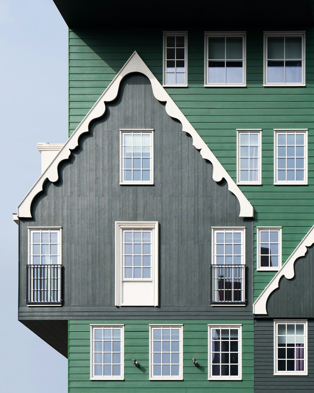 green and white wooden house