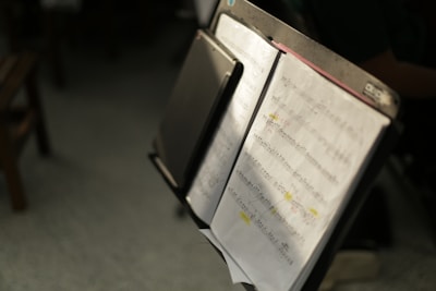 white printer paper on brown wooden table