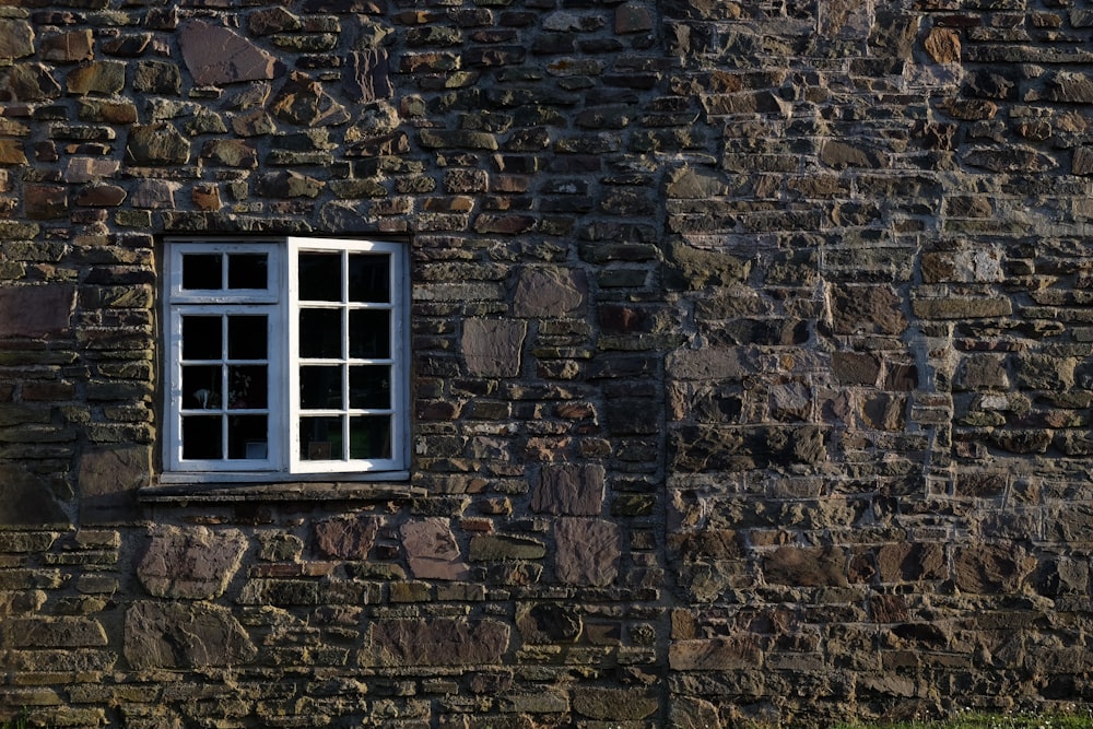 white wooden framed glass window