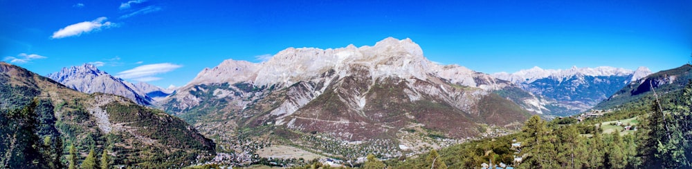 gray and white mountain under blue sky during daytime