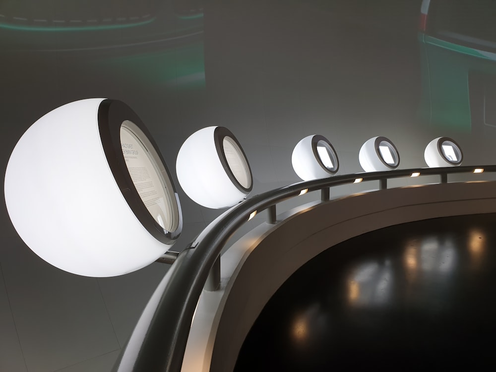 white and black round ceiling light