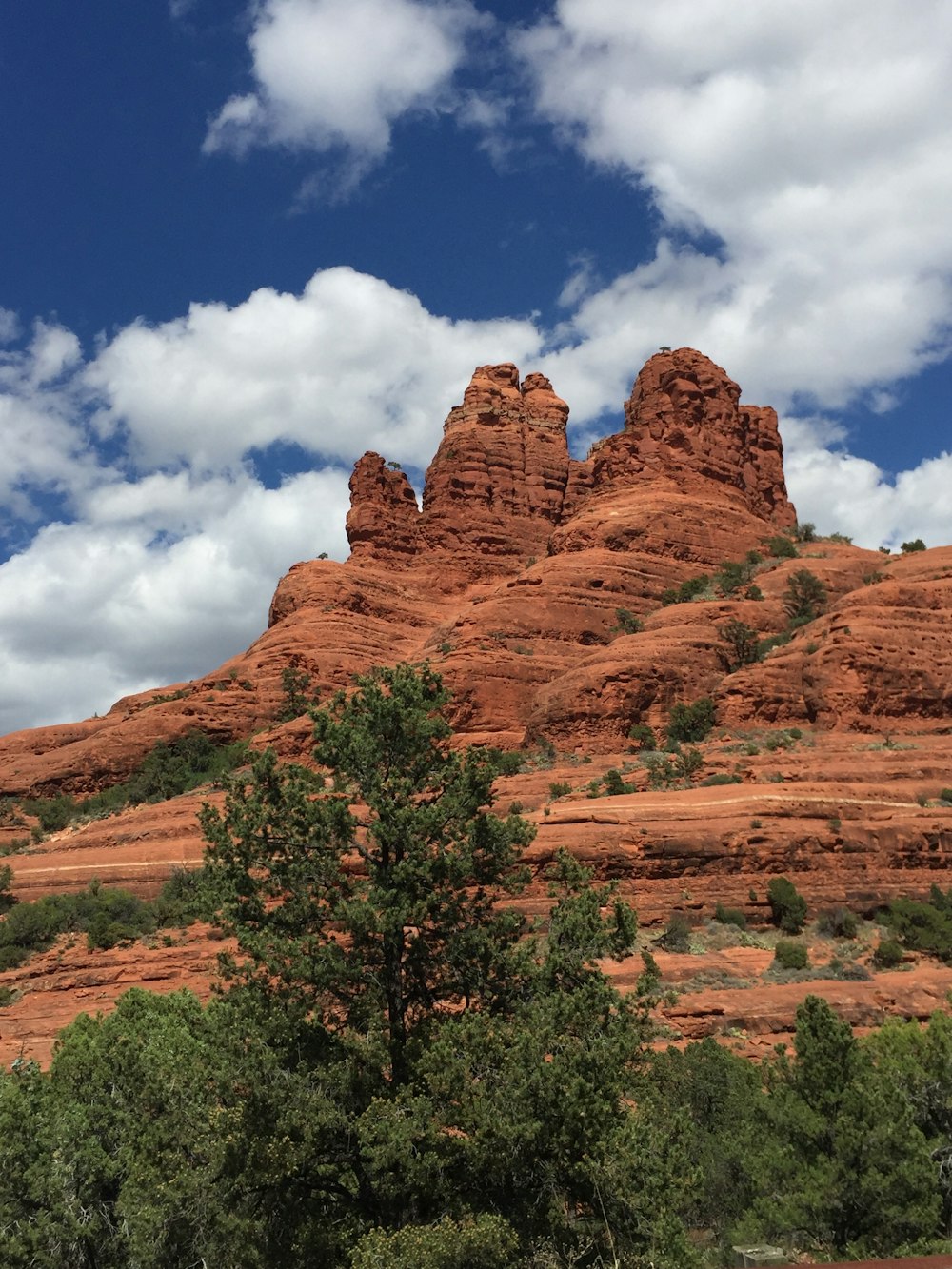 brown rock formation under blue sky during daytime