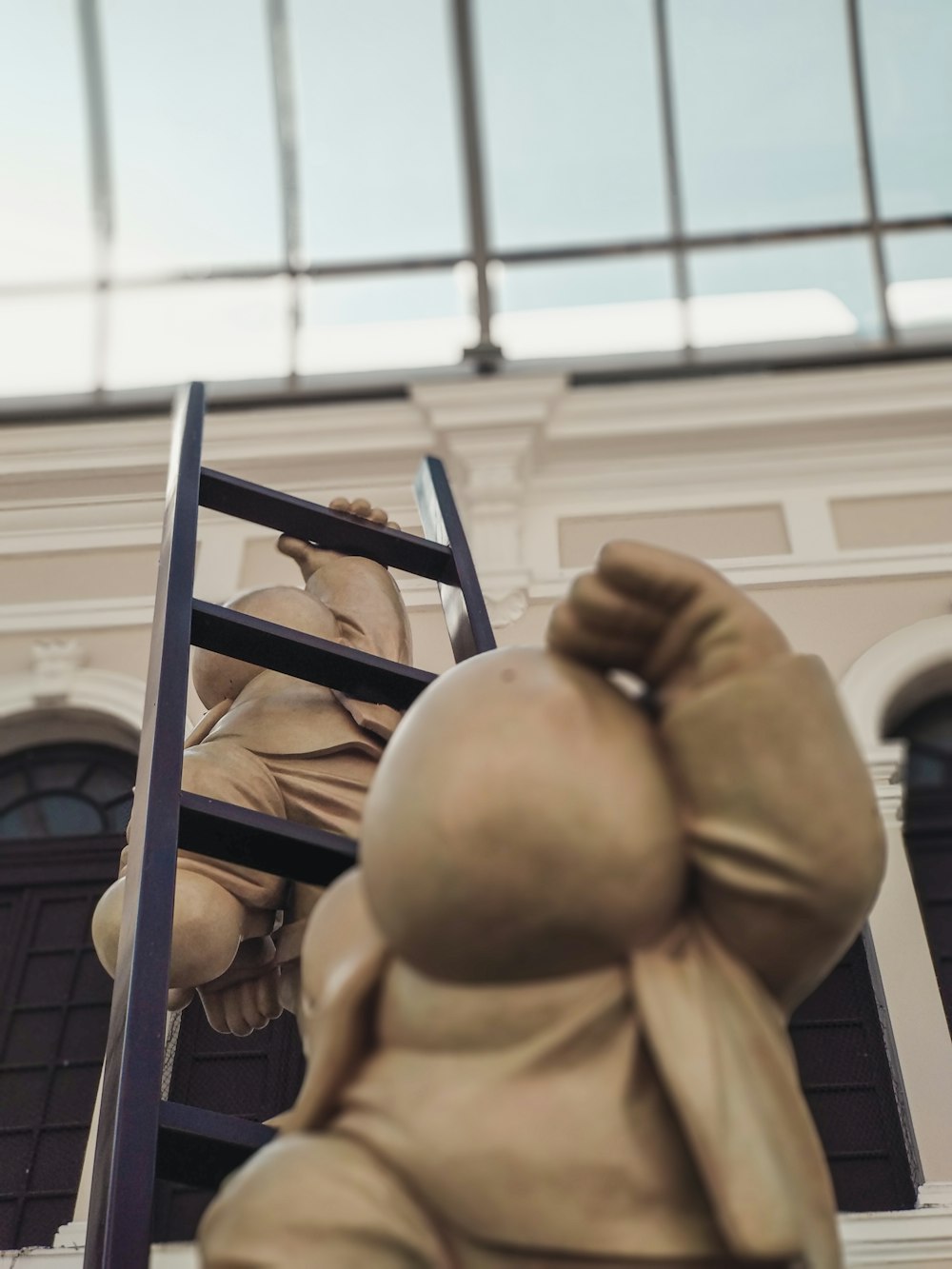 person in brown jacket holding brown wooden frame