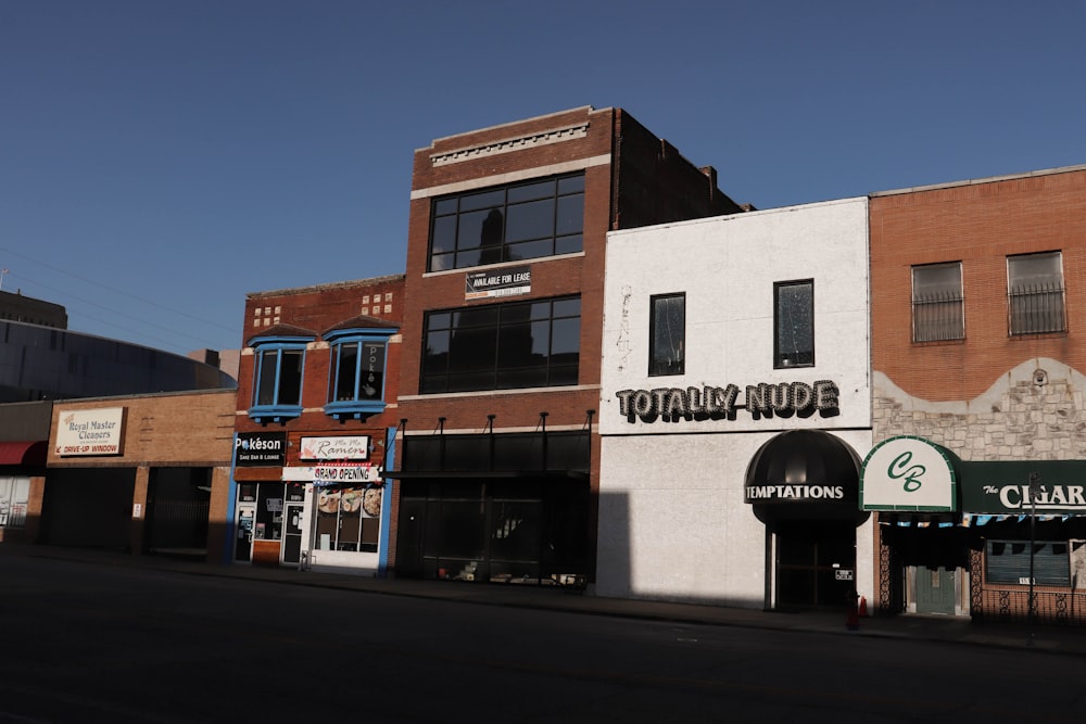 brown and white concrete building during daytime