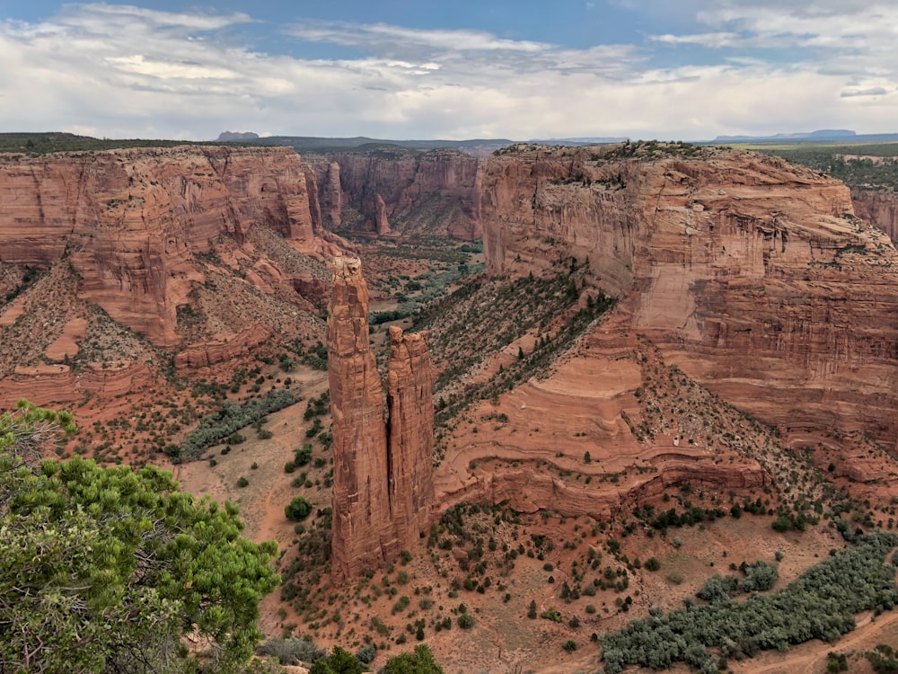 brown rock formation under blue sky during daytime